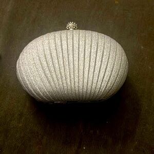 Silver sparkly clutch bag